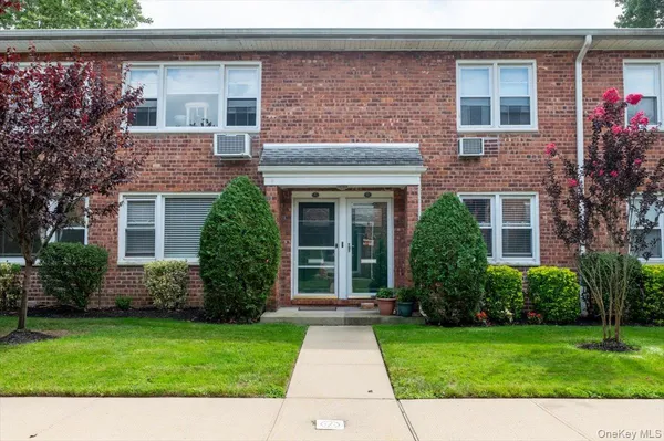 front view of house with a yard