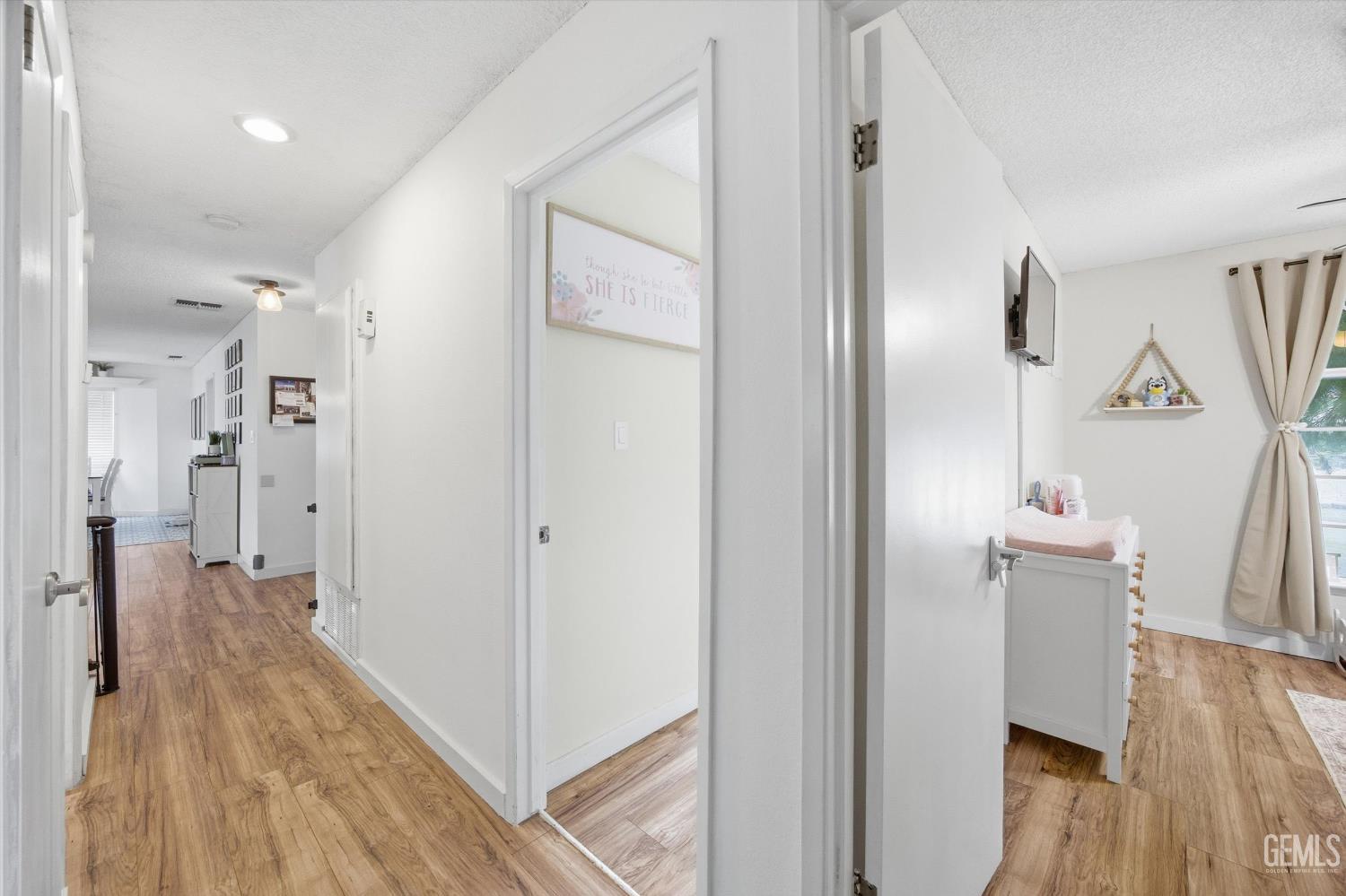 Undisclosed Address Tehachapi, CA 93561 - Photo 14 of 46 a view of hallway with wooden floor