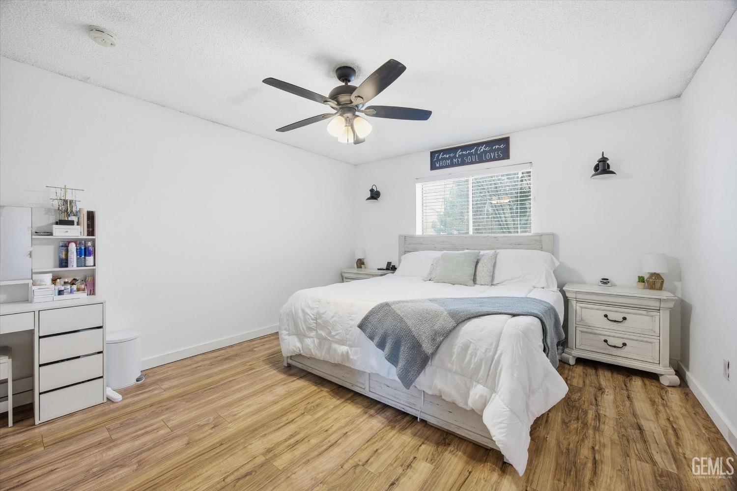 Undisclosed Address Tehachapi, CA 93561 - Photo 27 of 46 a bedroom with a bed and a dresser