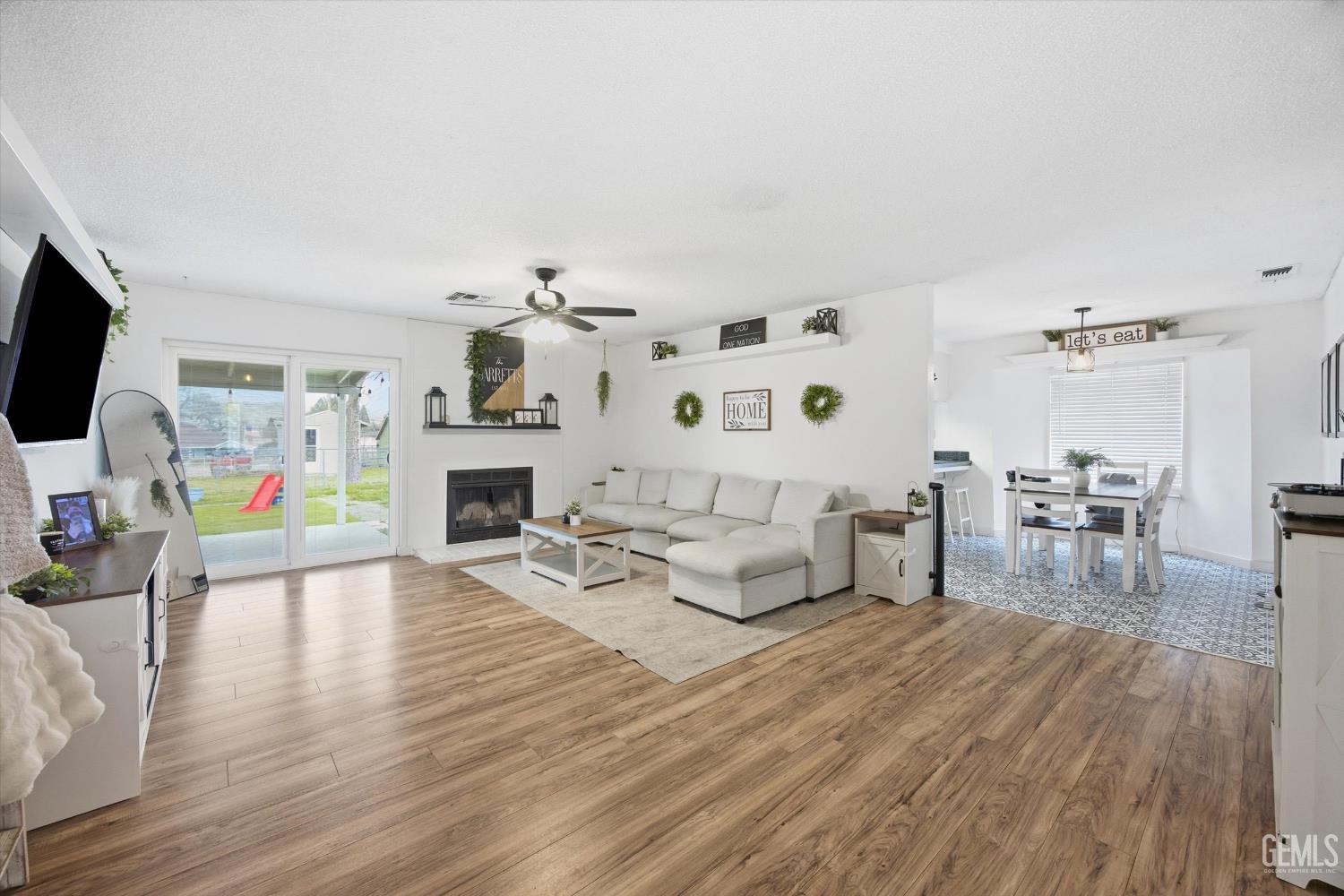 Undisclosed Address Tehachapi, CA 93561 - Photo 3 of 46 a living room with furniture and a fireplace