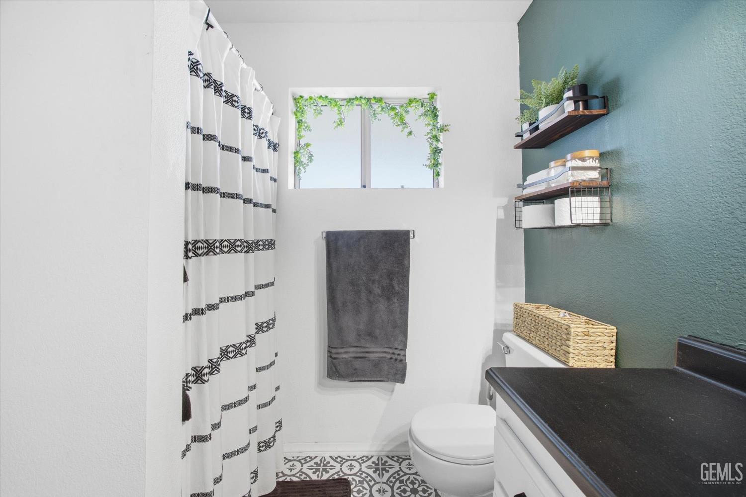 Undisclosed Address Tehachapi, CA 93561 - Photo 38 of 46 a bathroom with a toilet a sink and a shower