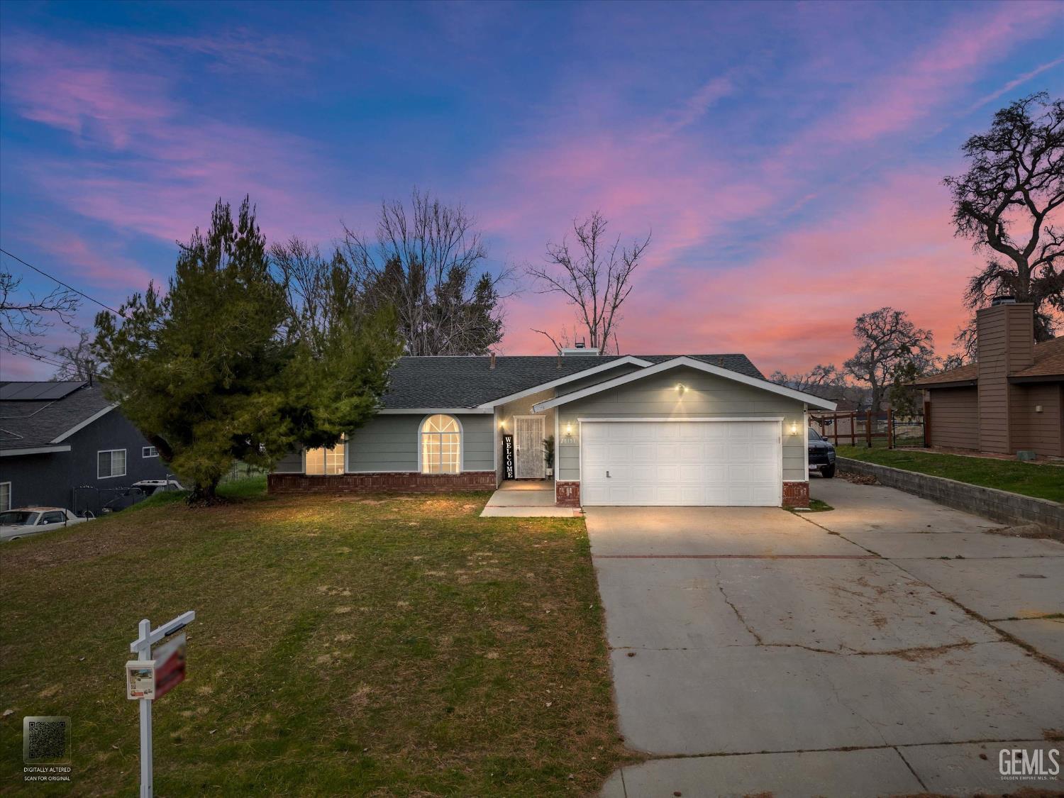 Undisclosed Address Tehachapi, CA 93561 - Photo 38 of 46 a front view of a house with a yard and garage