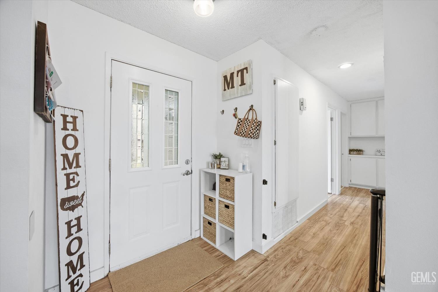 Undisclosed Address Tehachapi, CA 93561 - Photo 10 of 46 a view of a hallway with front door