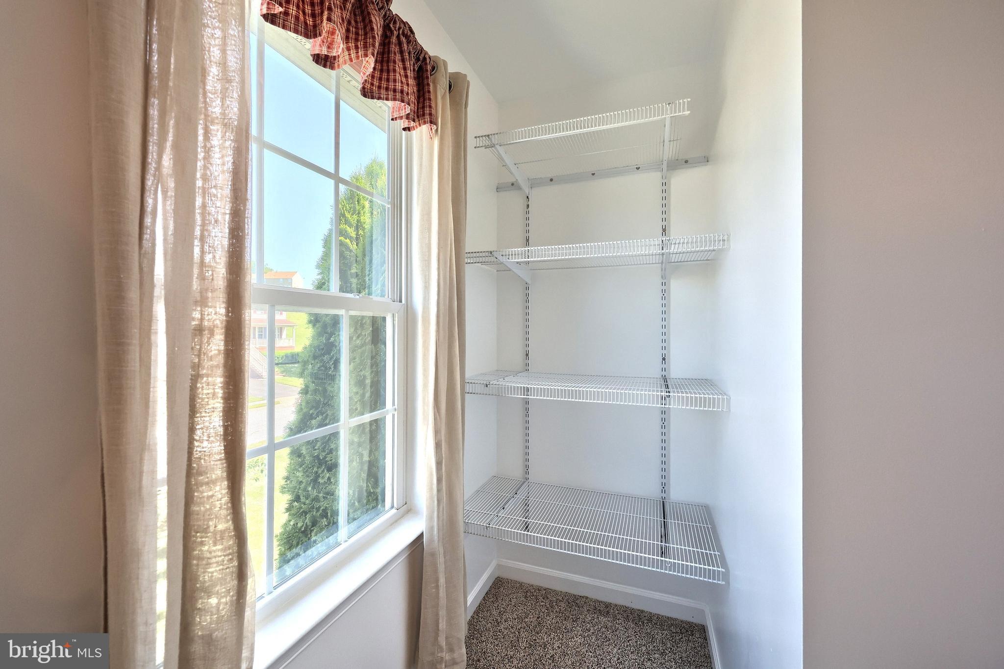 425 Lakeview Drive Spring Grove, PA 17362 - Photo 33 of 51 a view of walk in closet with empty racks