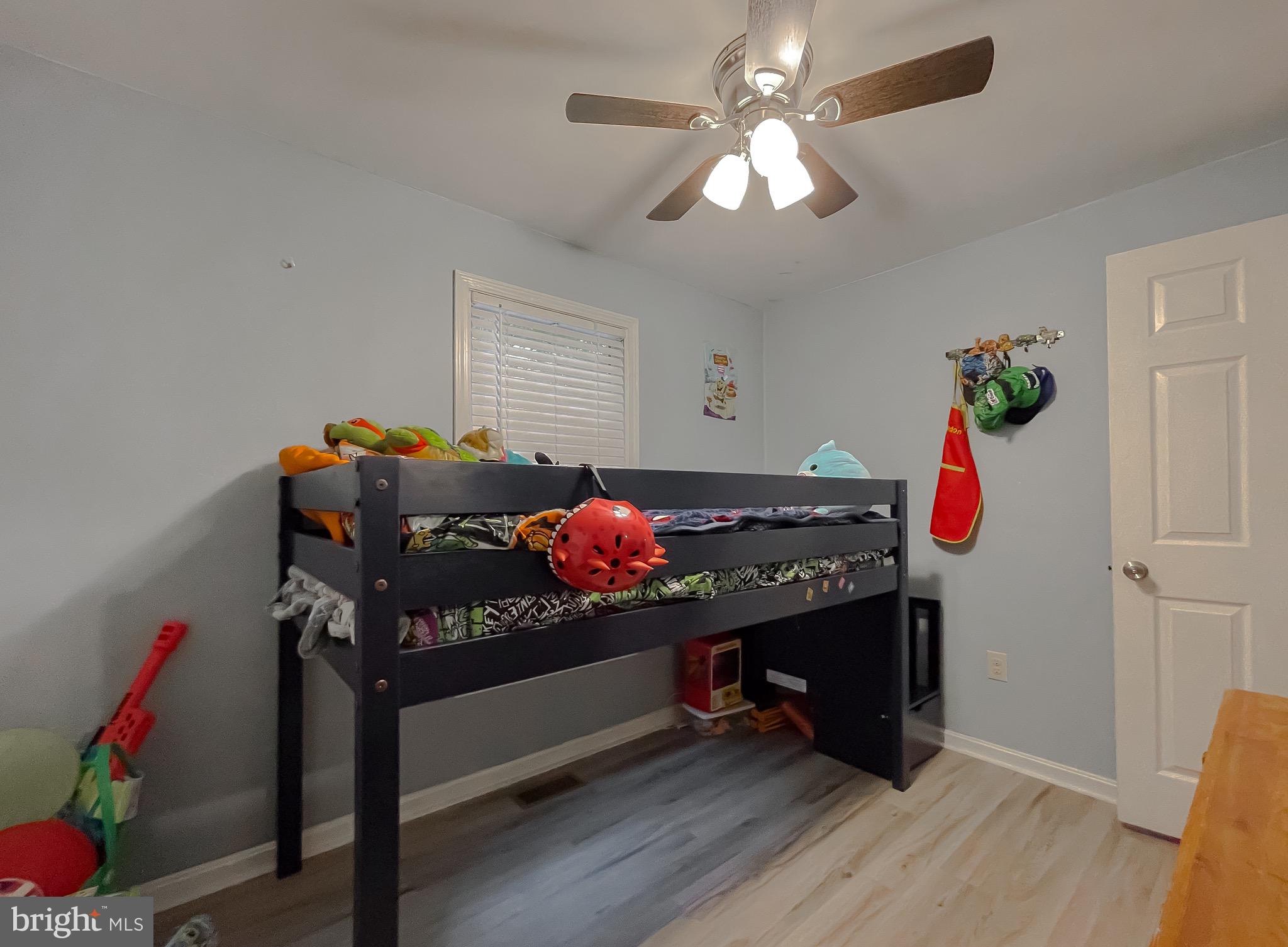 12788 Rio Grande Trail Lusby, MD 20657 - Photo 17 of 29 a room with furniture and wooden floor