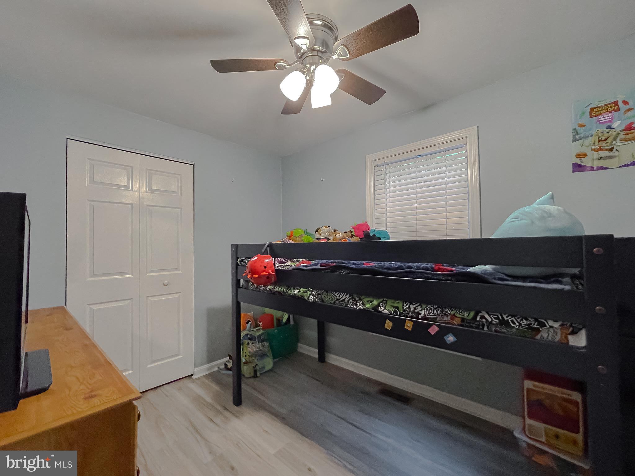 12788 Rio Grande Trail Lusby, MD 20657 - Photo 18 of 29 a room with furniture and wooden floor