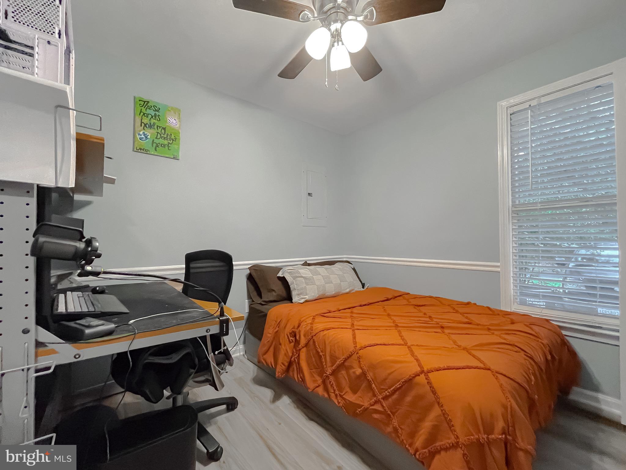 12788 Rio Grande Trail Lusby, MD 20657 - Photo 26 of 29 a bedroom with a bed and a desk
