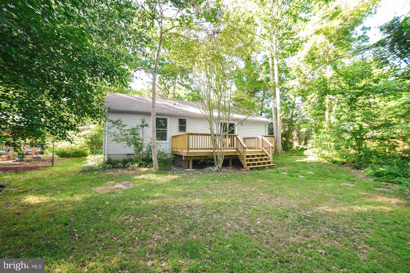 12788 Rio Grande Trail Lusby, MD 20657 - Photo 27 of 29 a view of a house with backyard