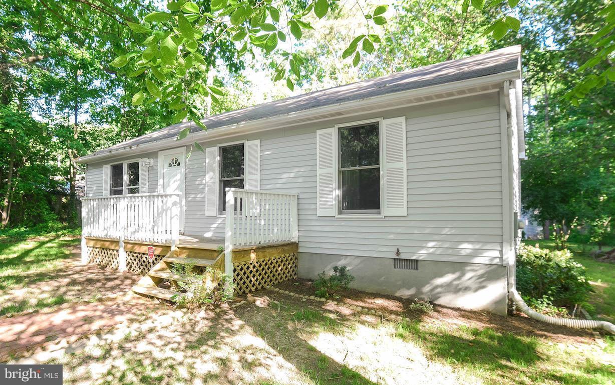 12788 Rio Grande Trail Lusby, MD 20657 - Photo 3 of 29 a backyard of a house