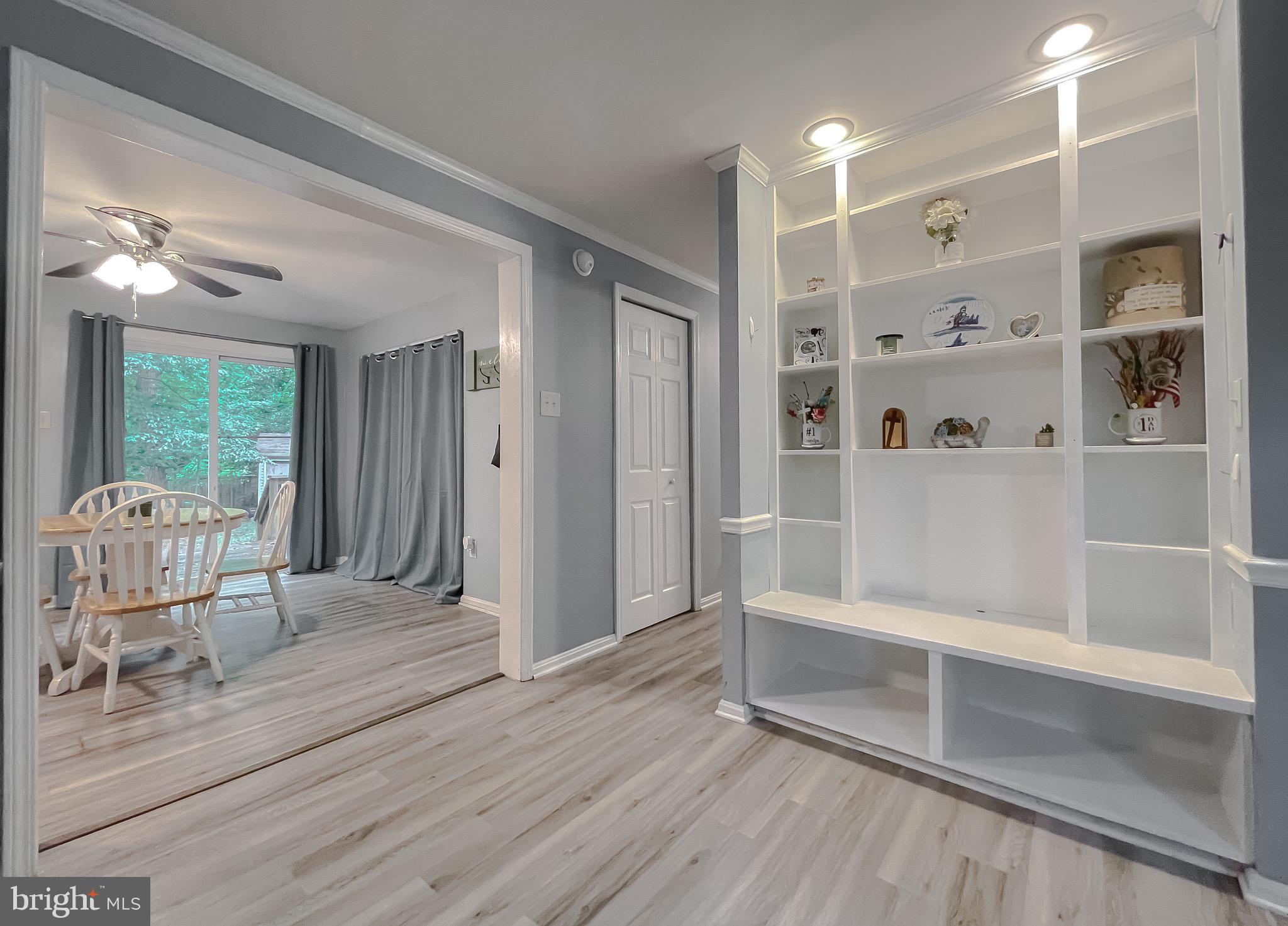 12788 Rio Grande Trail Lusby, MD 20657 - Photo 9 of 29 a view of a room with shelves on the wall
