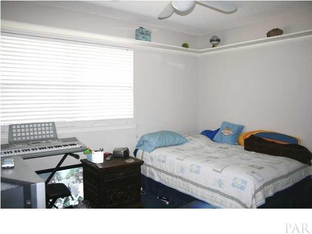 3925 Croydon Road Pensacola, FL 32514 - Photo 14 of 20 2nd Bedroom with built-in shelving