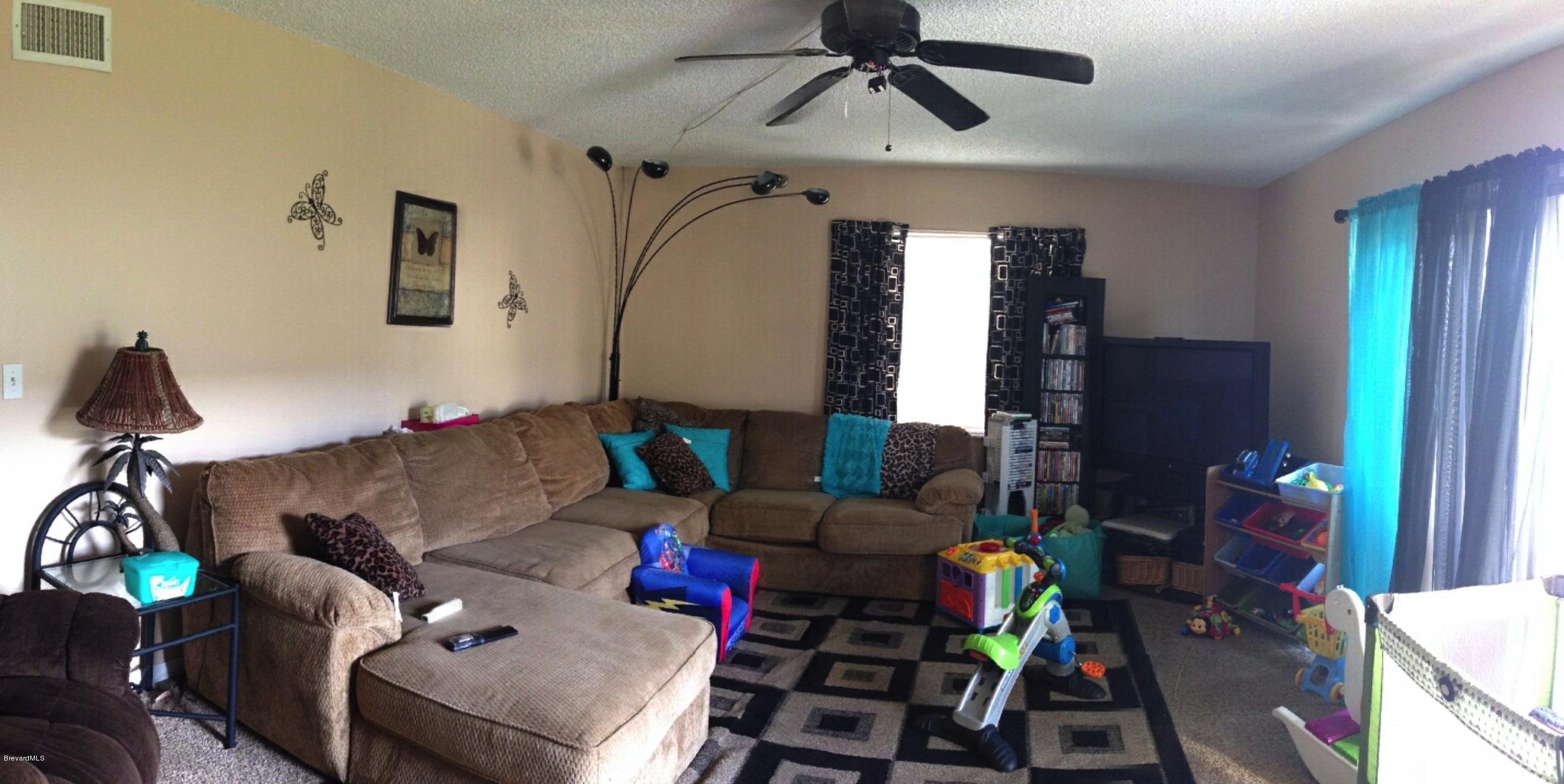 584 North Wickham Road, Unit 87 Melbourne, FL 32935 - Photo 2 of 6 Living Room