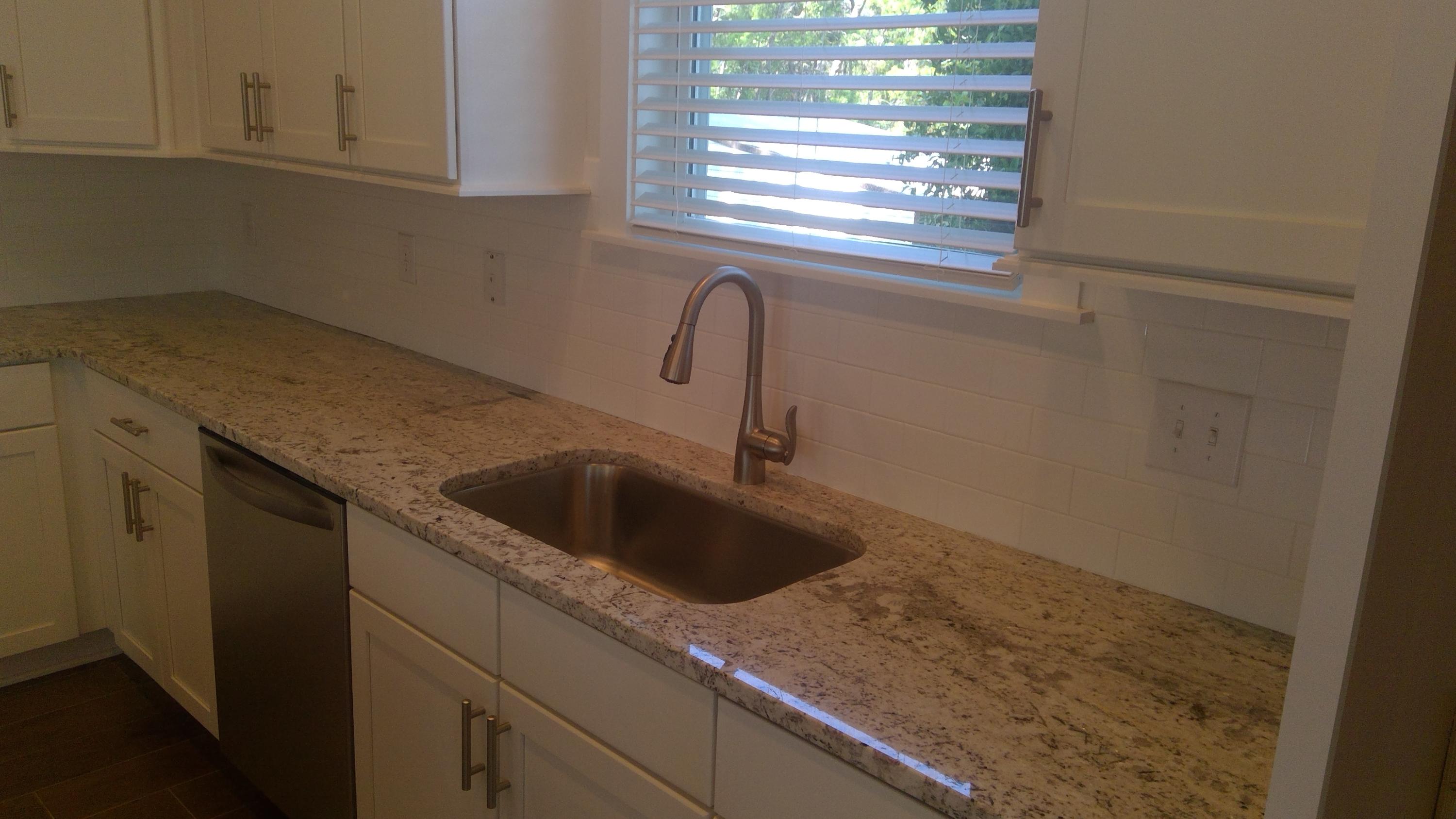 310 Grande Pointe Circle Inlet Beach, FL 32461 - Photo 12 of 63 a close view of a sink a faucet and window in the kitchen