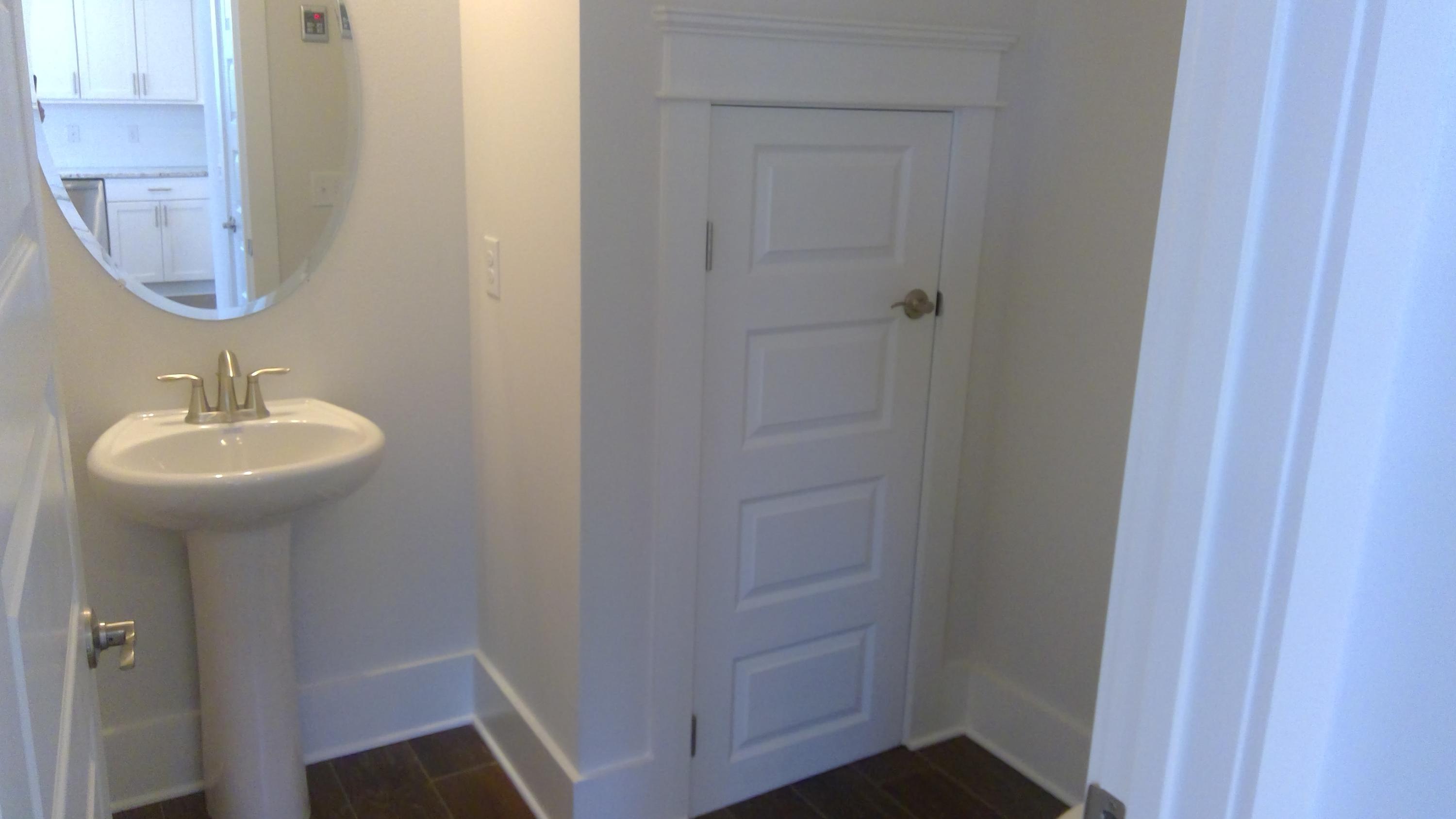 310 Grande Pointe Circle Inlet Beach, FL 32461 - Photo 14 of 63 a bathroom with a sink a mirror and vanity