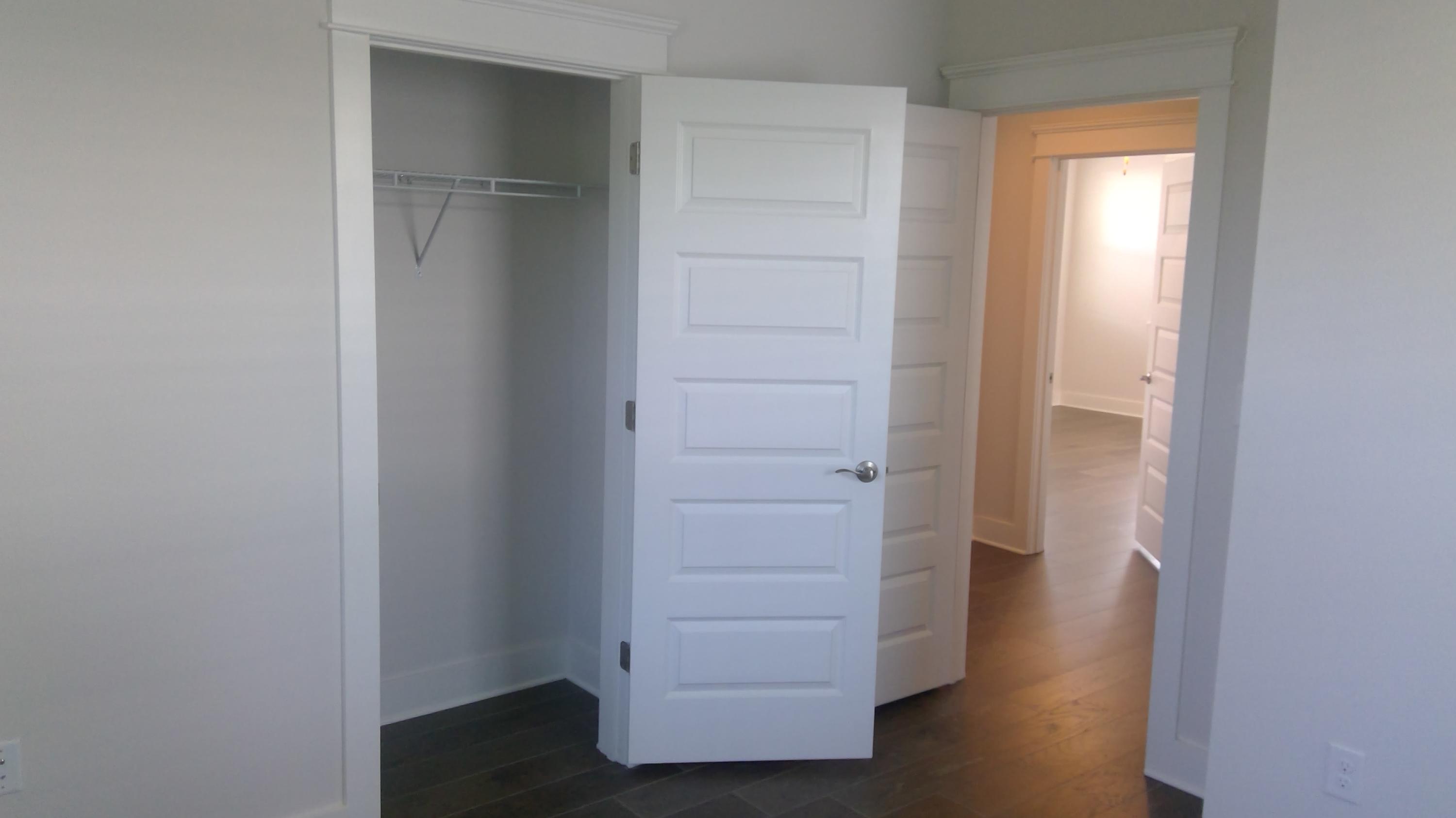 310 Grande Pointe Circle Inlet Beach, FL 32461 - Photo 23 of 63 a view of walk in closet with empty racks