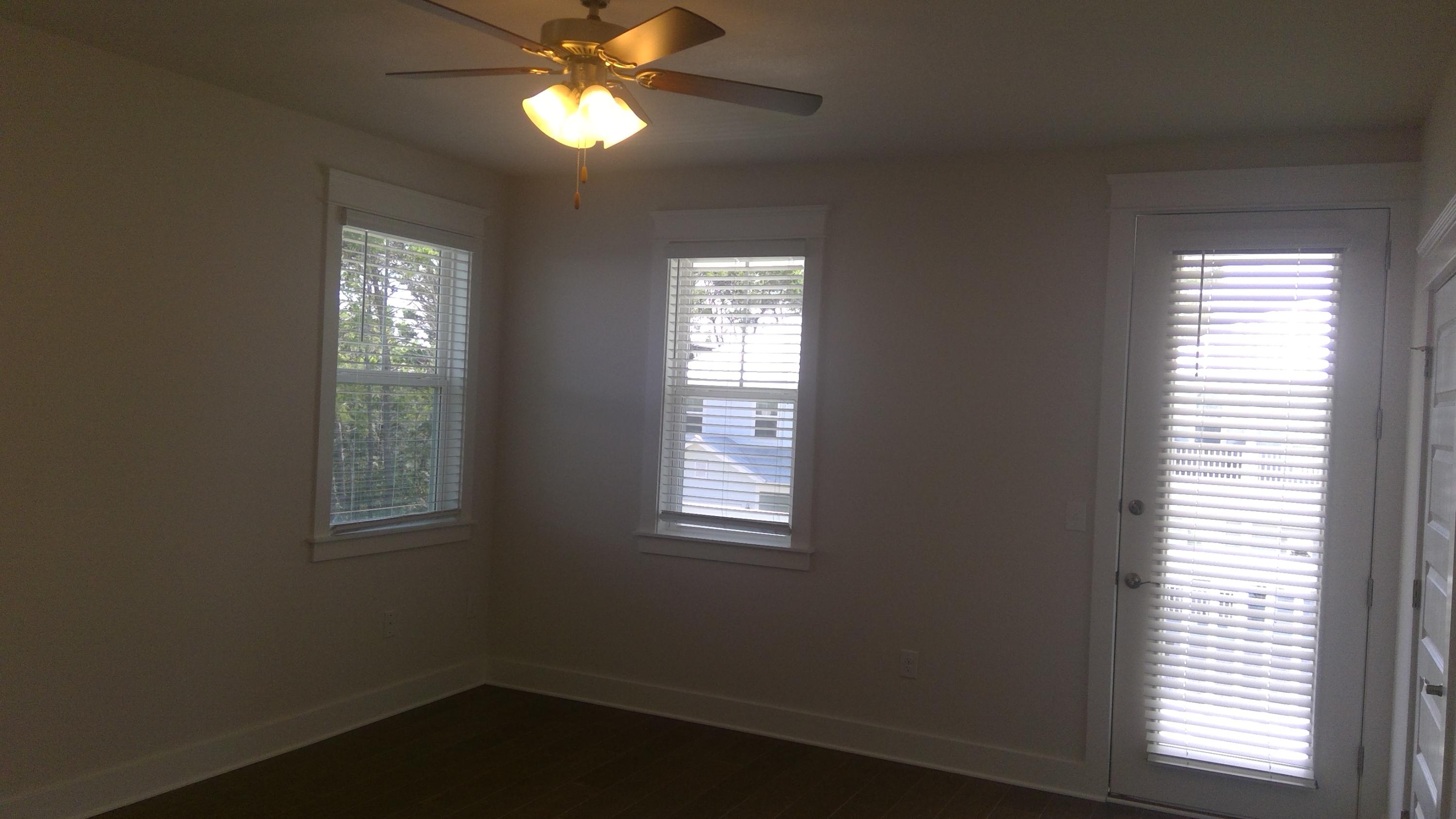 310 Grande Pointe Circle Inlet Beach, FL 32461 - Photo 29 of 63 a view of an empty room with wooden floor and windows