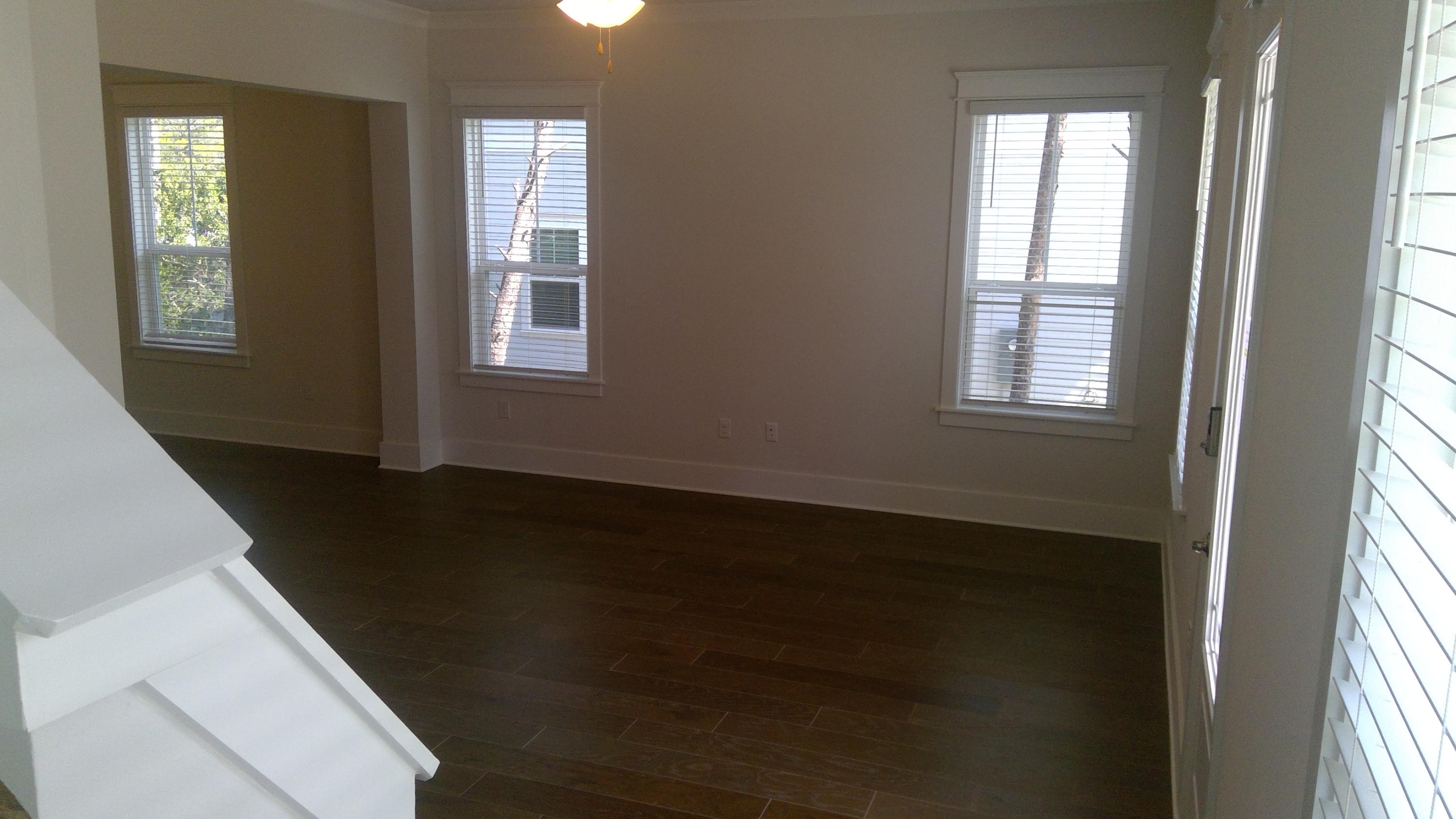 310 Grande Pointe Circle Inlet Beach, FL 32461 - Photo 37 of 63 a view of an empty room with wooden floor and a window