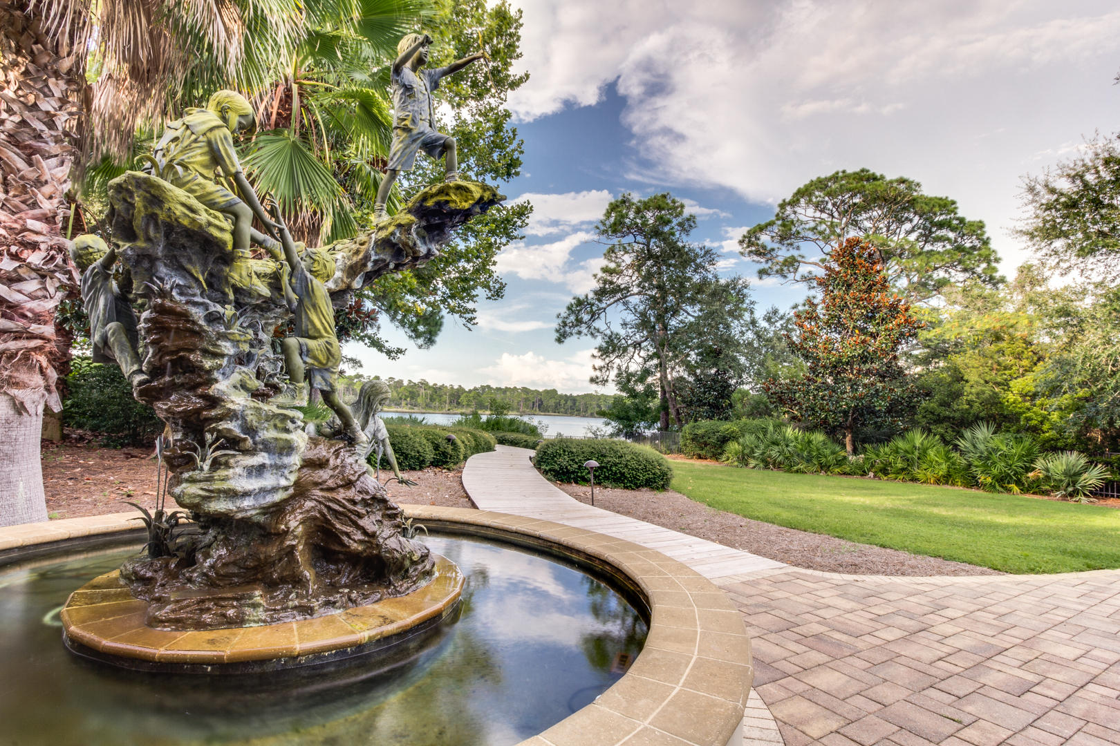 310 Grande Pointe Circle Inlet Beach, FL 32461 - Photo 52 of 63 a view of a swimming pool with a yard