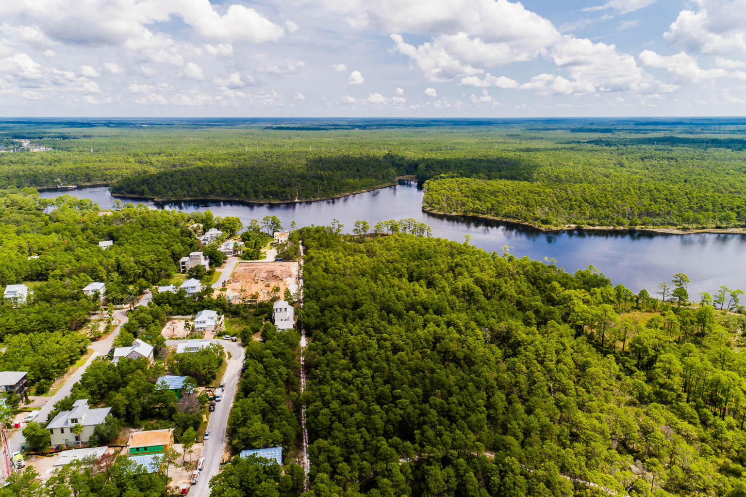 310 Grande Pointe Circle Inlet Beach, FL 32461 - Photo 60 of 63 a view of a lake with a city