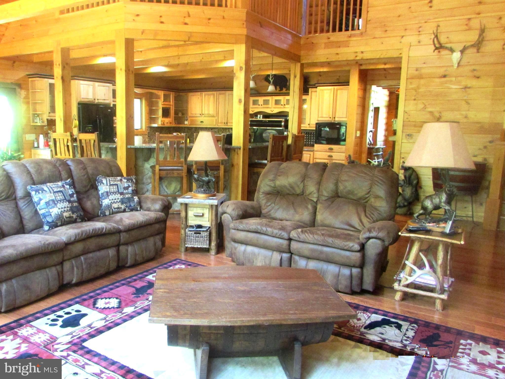 2332 Carrollton Road Westminster, MD 21157 - Photo 12 of 32 Great room to breakfast bar seating and loft above