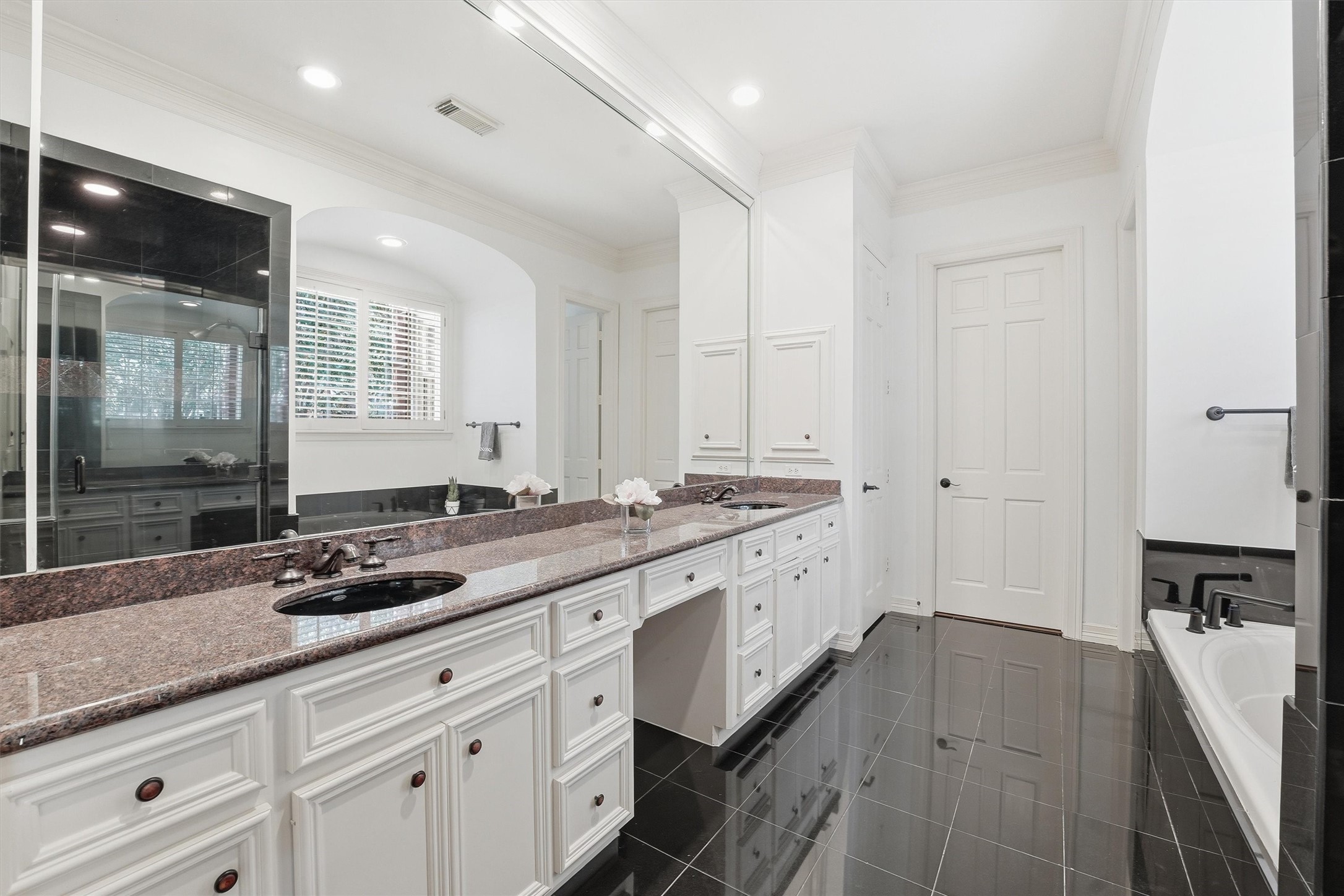 3210 Maroneal Street Houston, TX 77025 - Photo 14 of 28 a kitchen with a sink stove and cabinets