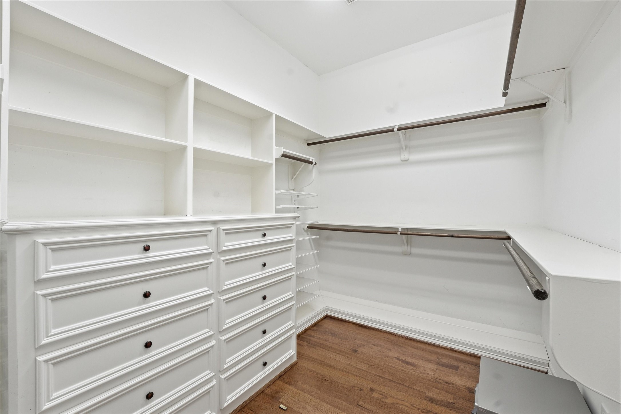 3210 Maroneal Street Houston, TX 77025 - Photo 16 of 28 a view of walk in closet with empty racks