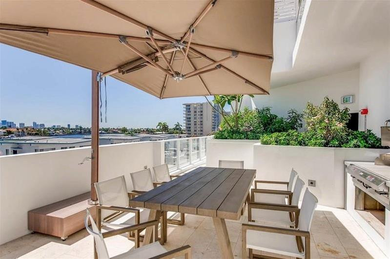 401 North Birch Road, Unit 515 Fort Lauderdale, FL 33304 - Photo 14 of 23 a view of a chairs and table on the terrace