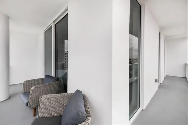 a bathroom with a shower and toilet