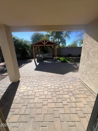 a view of balcony with furniture