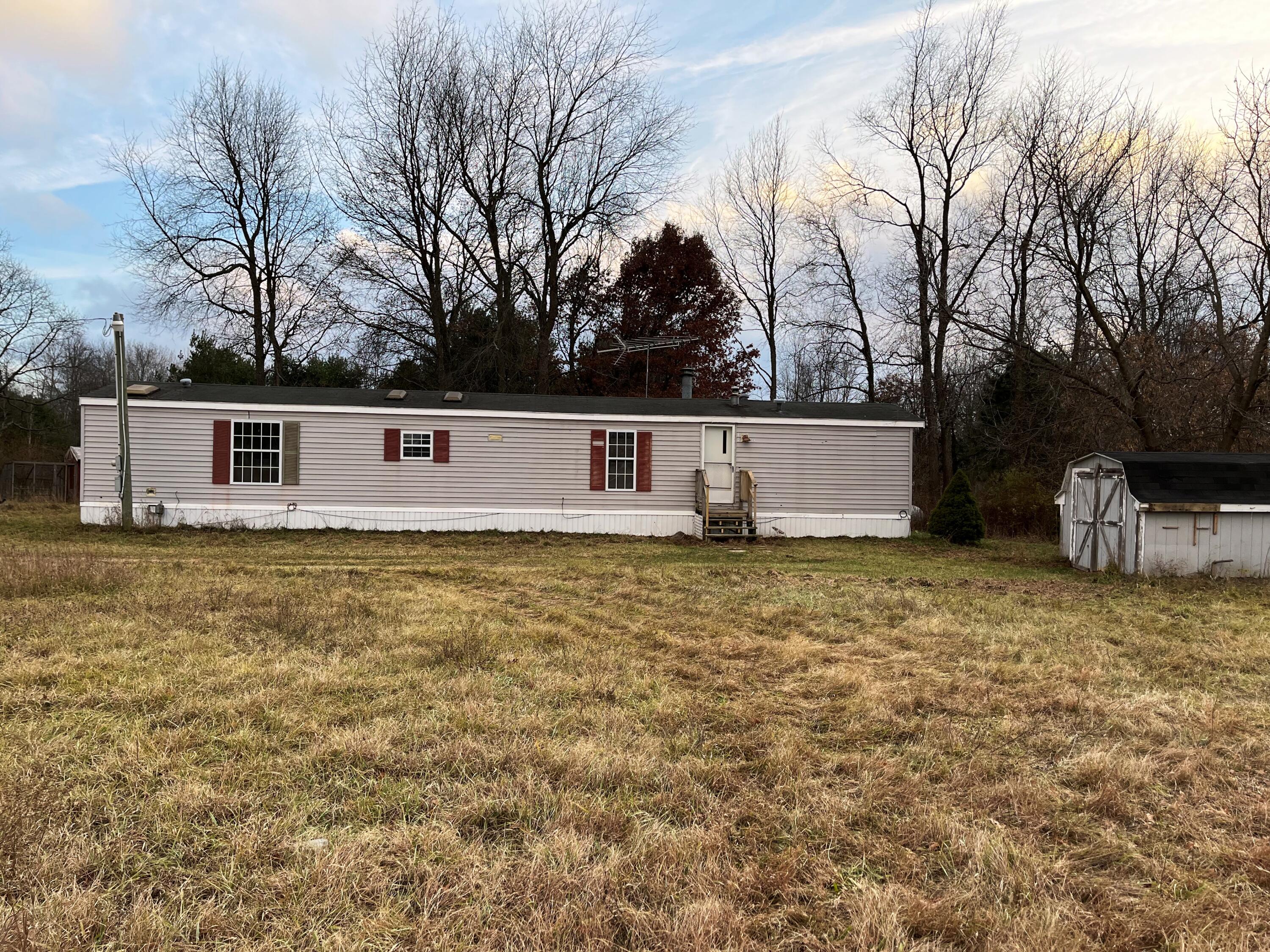 12377 McKinley Road Rodney, MI 49342 - Photo 1 of 10 IMG_1613