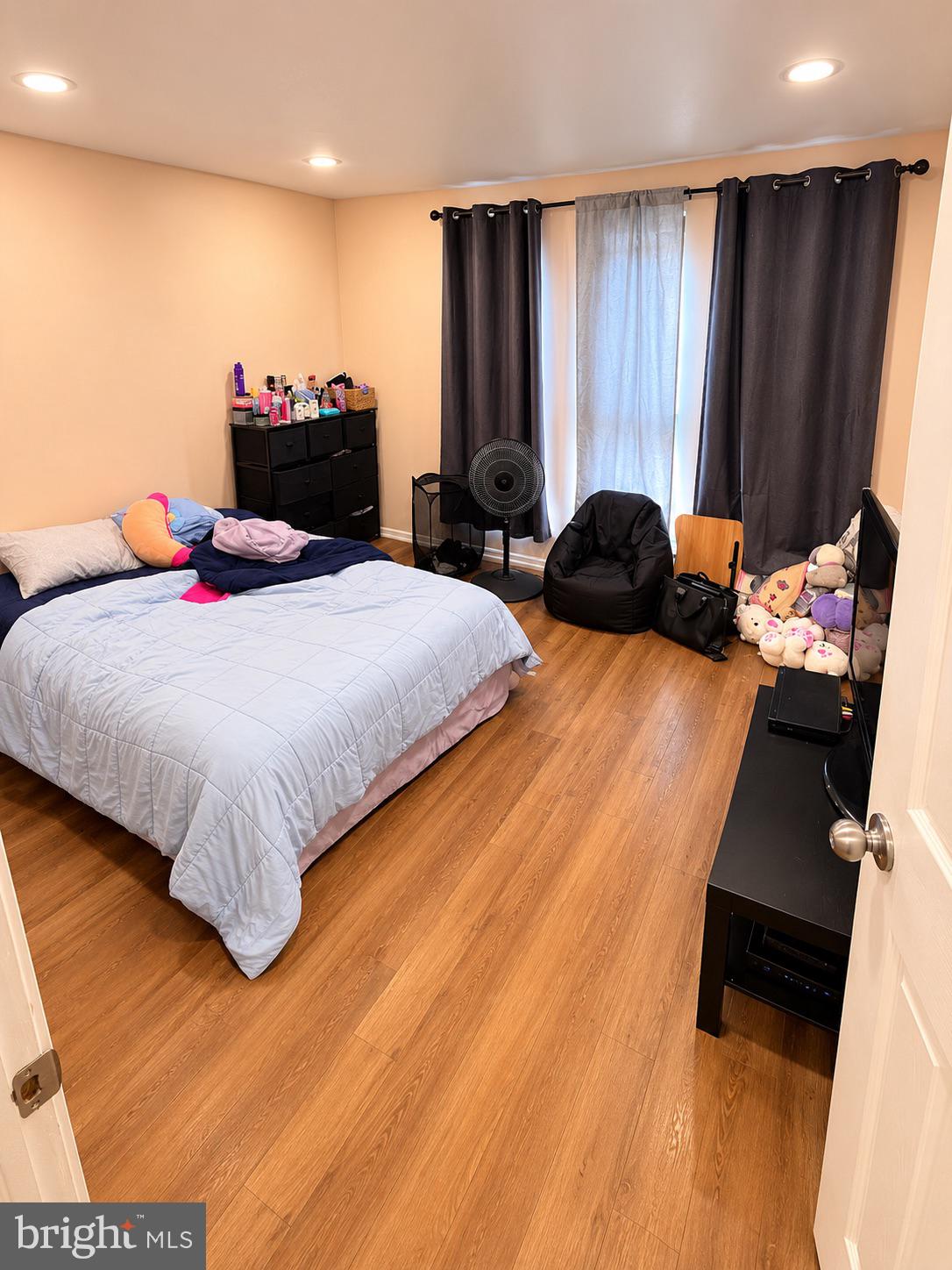 25 South Church Road, Unit 52 Maple Shade, NJ 08052 - Photo 8 of 10 a bedroom with bed and large window