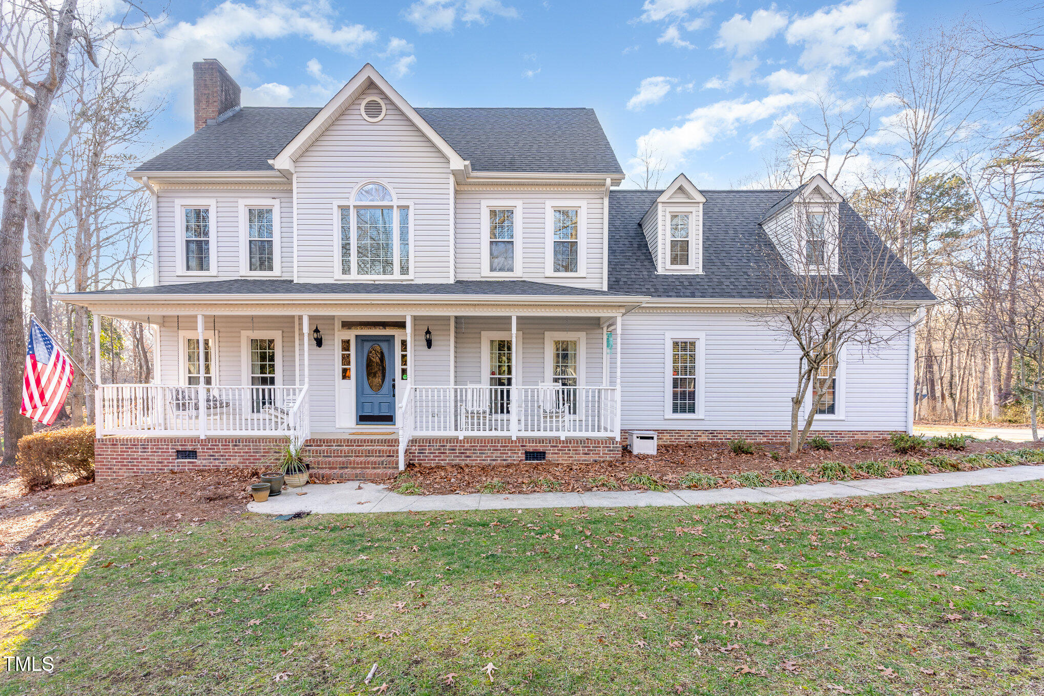 6132 Wolverhampton Drive Raleigh, NC 27603 - Photo 1 of 40 a front view of a house with a yard