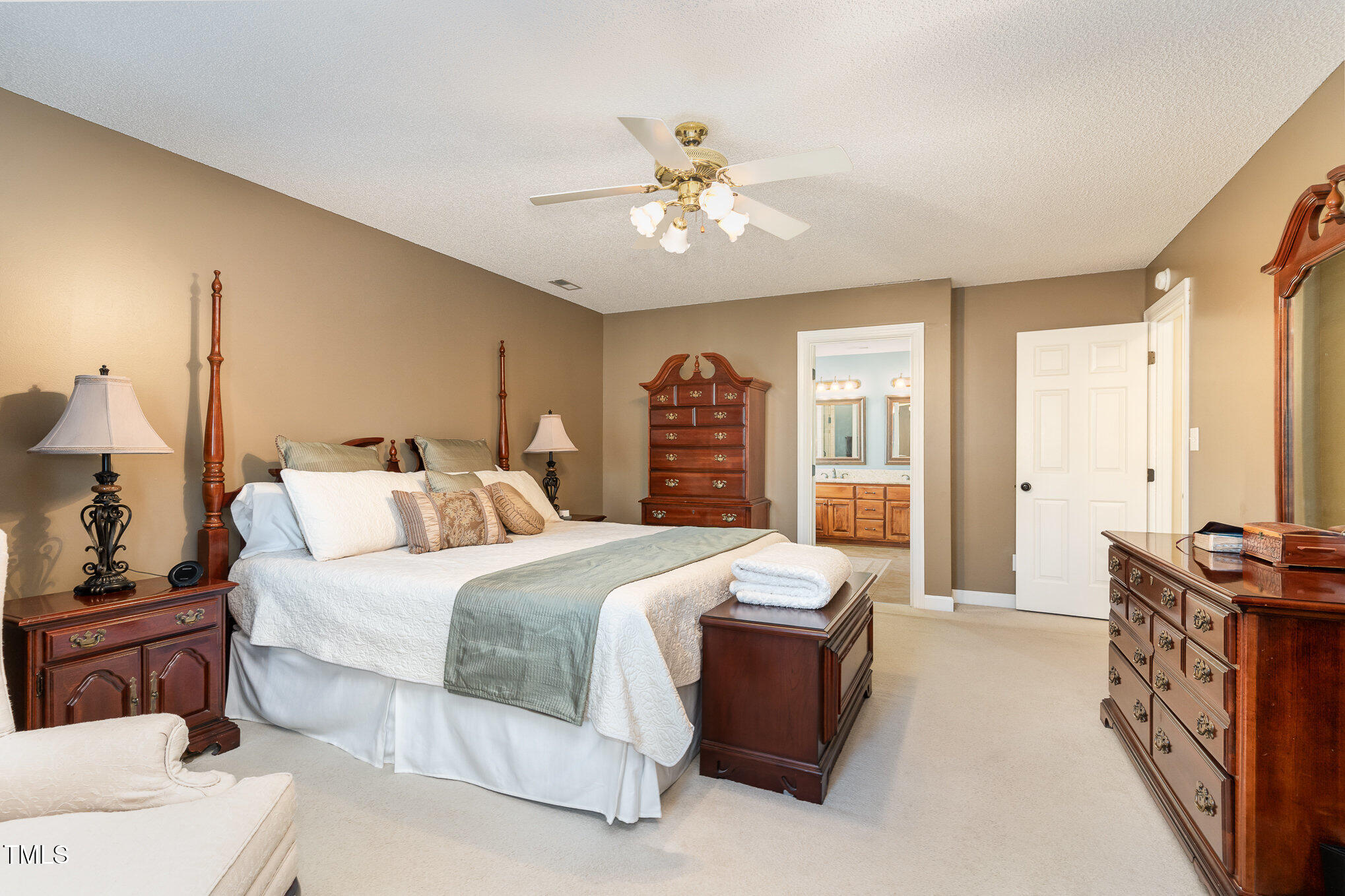 6132 Wolverhampton Drive Raleigh, NC 27603 - Photo 18 of 40 a bedroom with bed and window