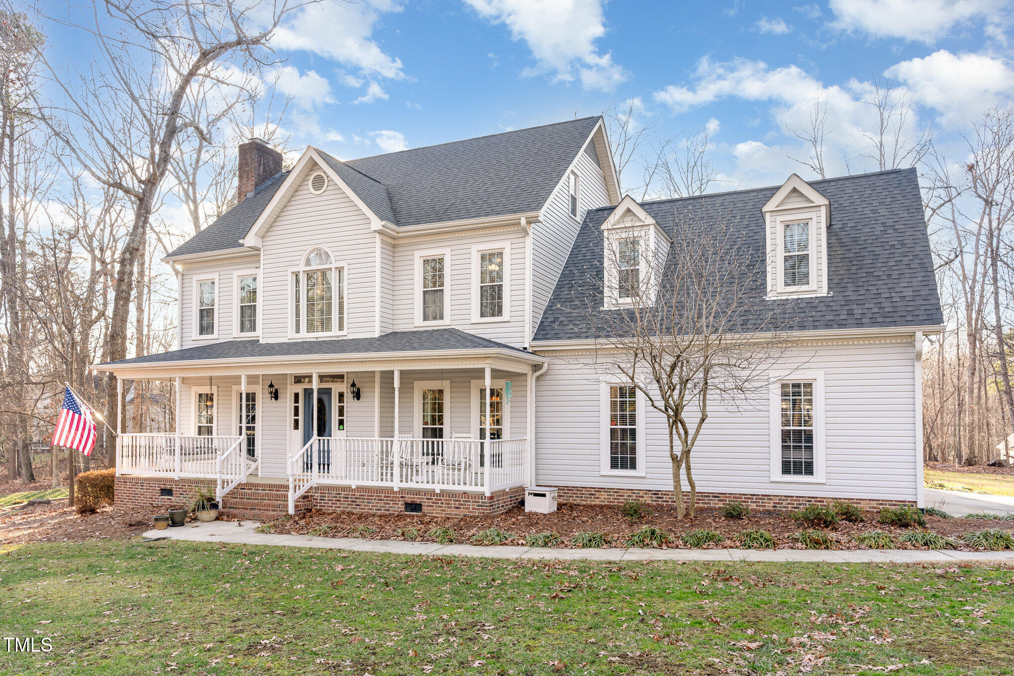 6132 Wolverhampton Drive Raleigh, NC 27603 - Photo 2 of 40 a front view of a house with a yard