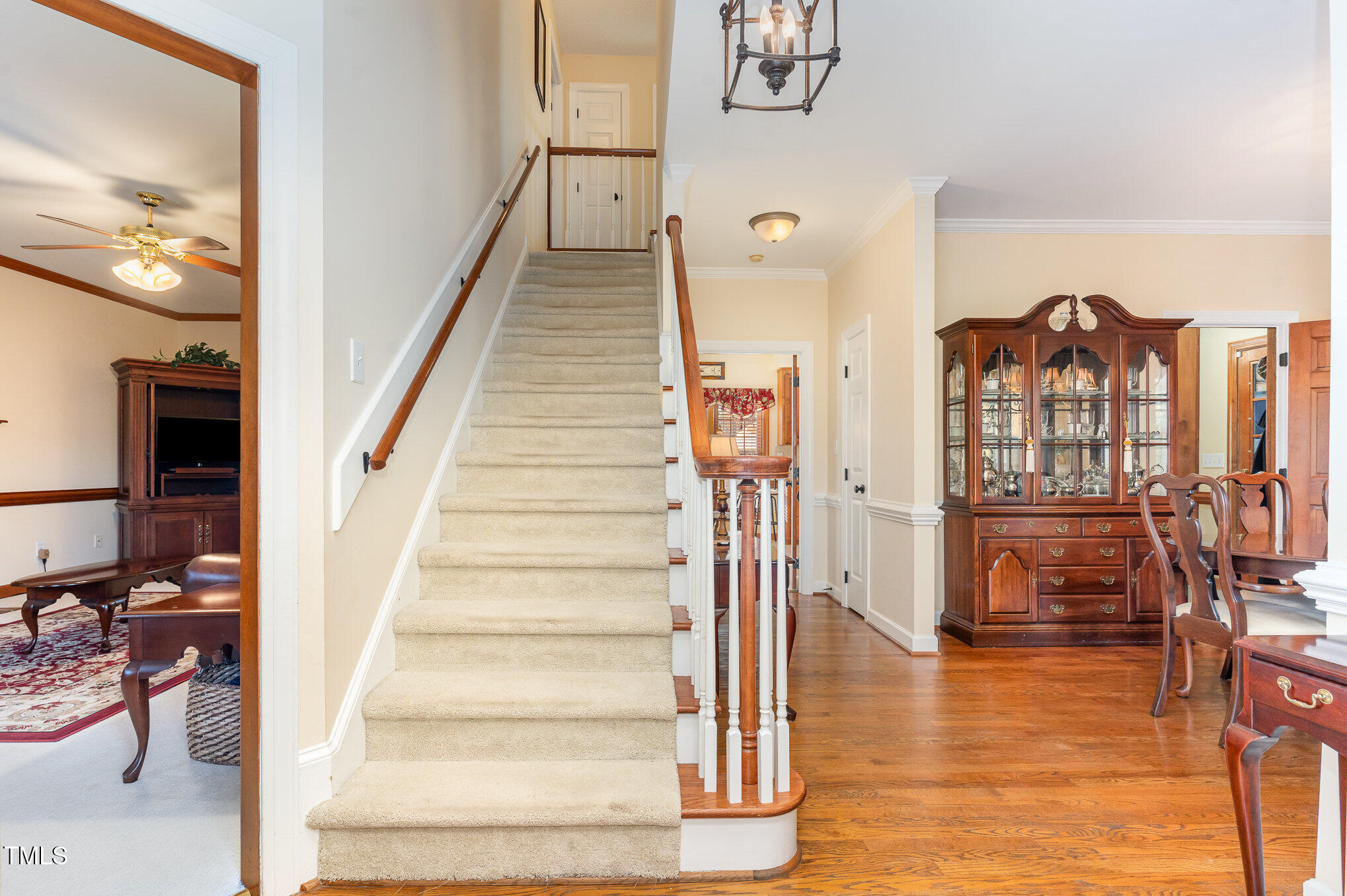 6132 Wolverhampton Drive Raleigh, NC 27603 - Photo 4 of 40 a view of entryway and hall with wooden floor