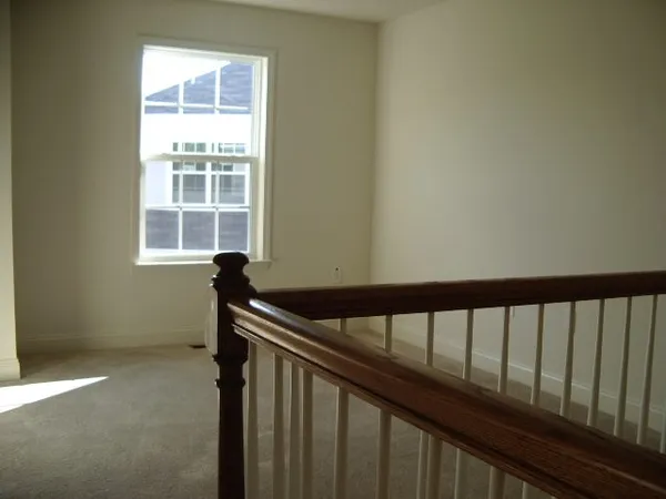 a view of balcony with a window
