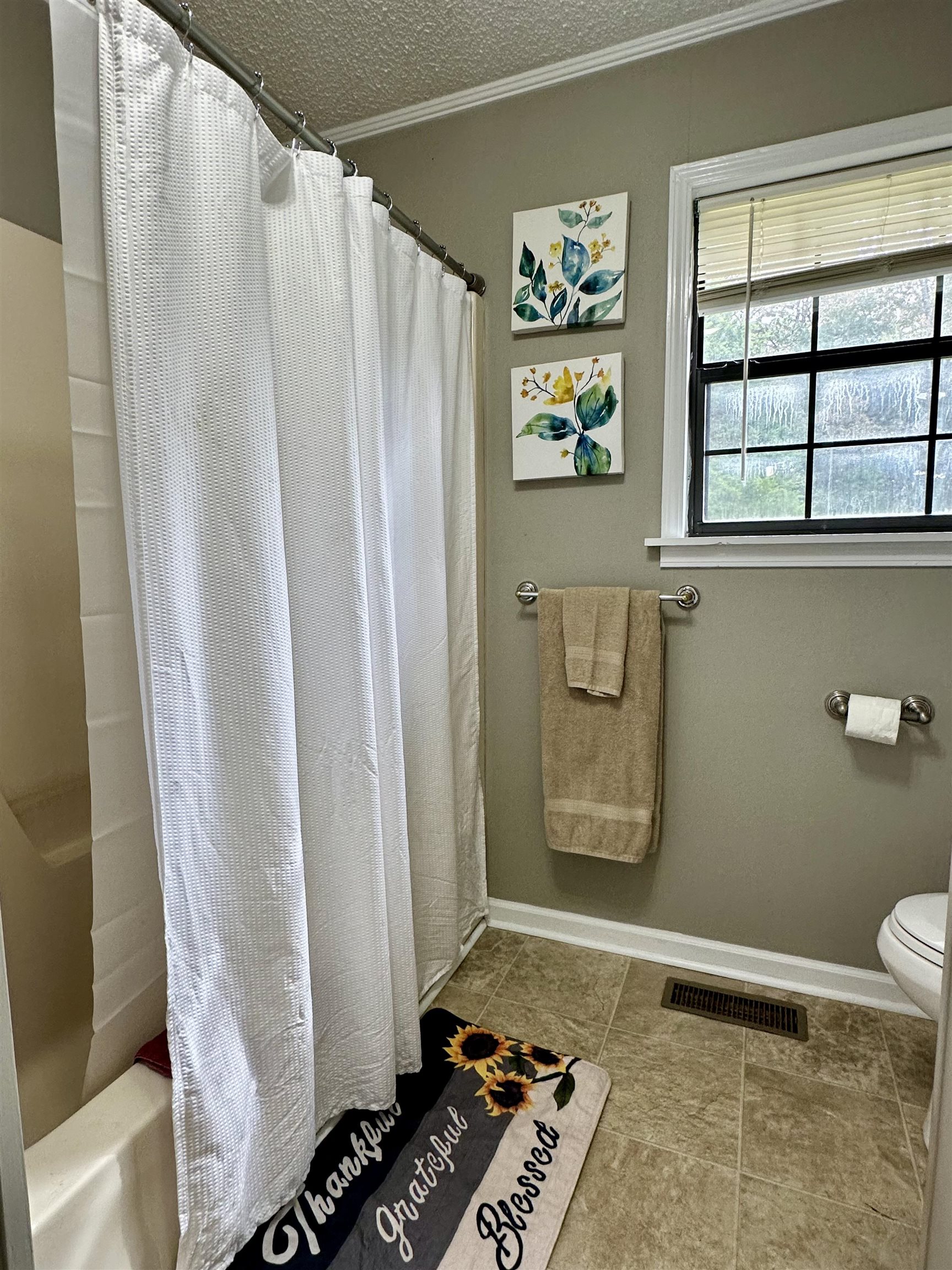 320 Clayton Road Finger, TN 38334 - Photo 13 of 16 a bathroom with a shower and a sink