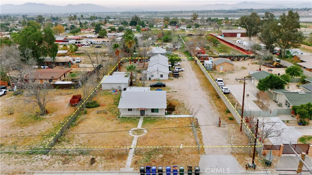 2523 Ogden Street Muscoy, CA 92407 - Photo 2 of 31 an aerial view of residential houses with outdoor space