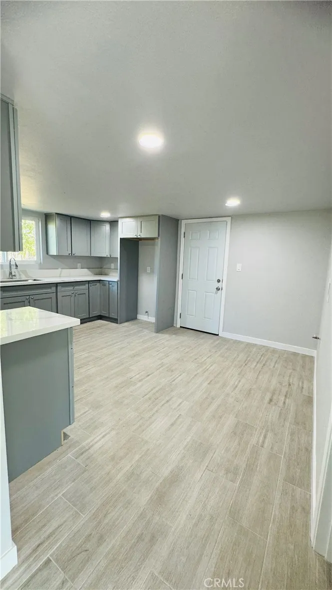 2523 Ogden Street Muscoy, CA 92407 - Photo 23 of 31 a view of a kitchen with a sink