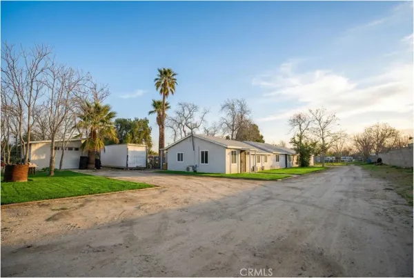 front view of a house with a big yard