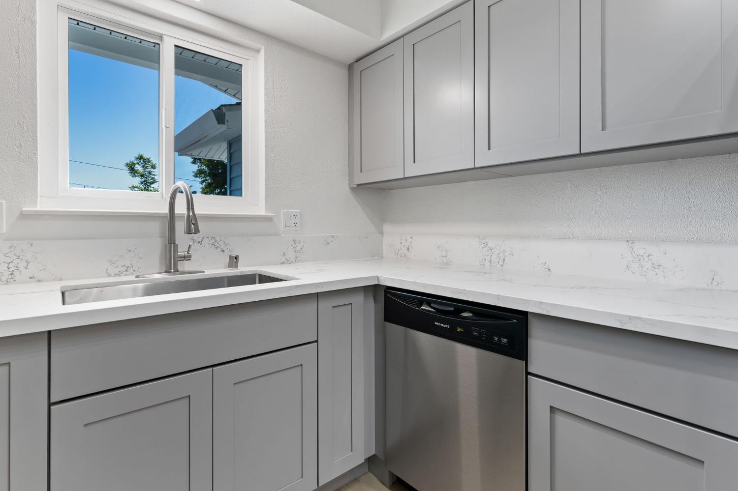 3270 Nareb Street Sacramento, CA 95838 - Photo 13 of 28 a kitchen with a sink and cabinets