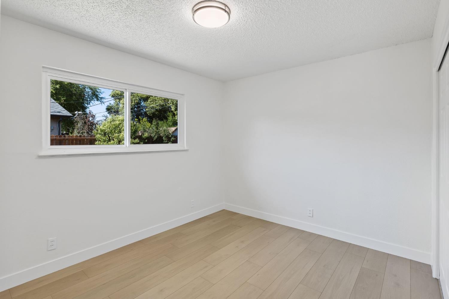 3270 Nareb Street Sacramento, CA 95838 - Photo 18 of 28 an empty room with a window