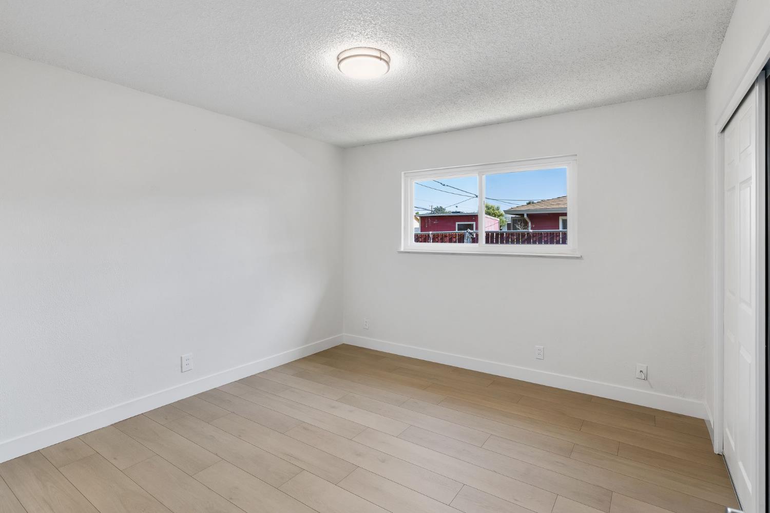 3270 Nareb Street Sacramento, CA 95838 - Photo 20 of 28 an empty room with a painting on the wall