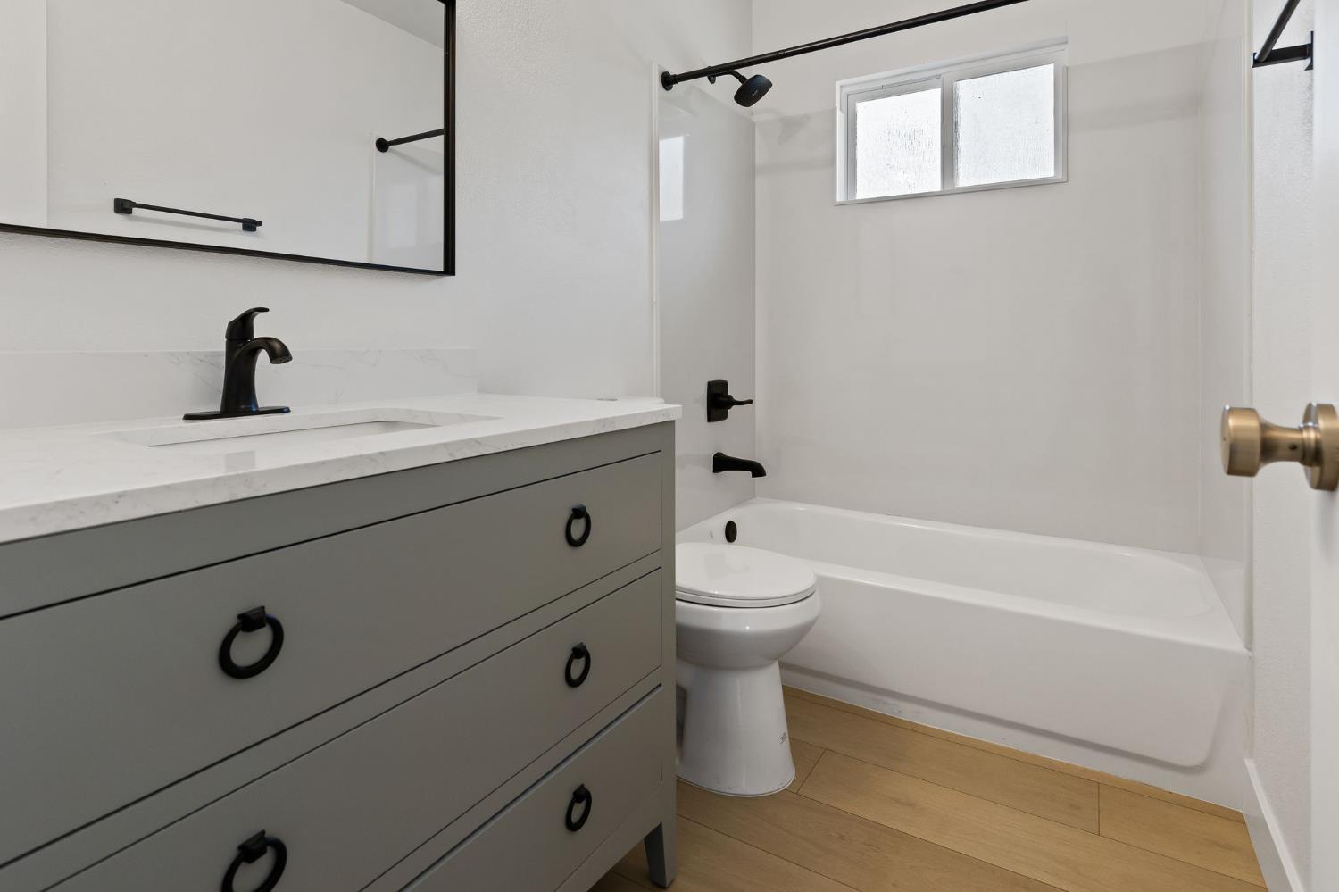 3270 Nareb Street Sacramento, CA 95838 - Photo 23 of 28 a bathroom with a sink a toilet and bathtub