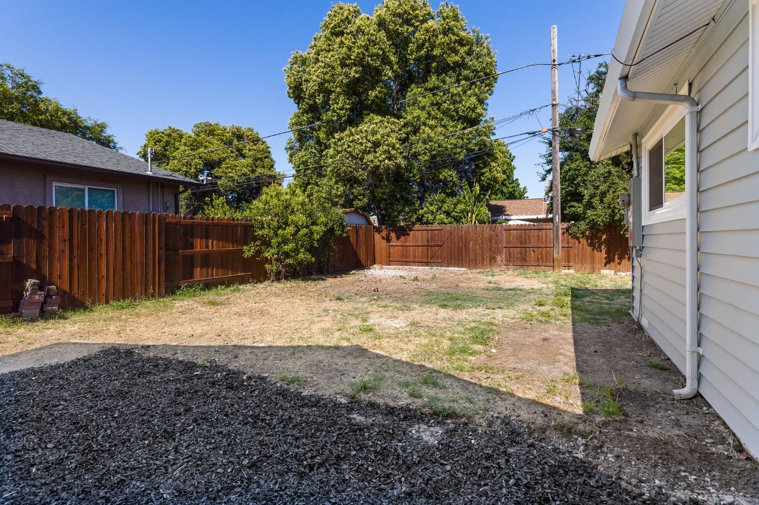 3270 Nareb Street Sacramento, CA 95838 - Photo 24 of 28 a view of a yard with wooden fence