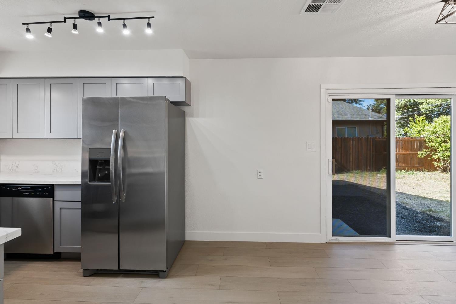 3270 Nareb Street Sacramento, CA 95838 - Photo 9 of 28 a kitchen with a refrigerator and a sink