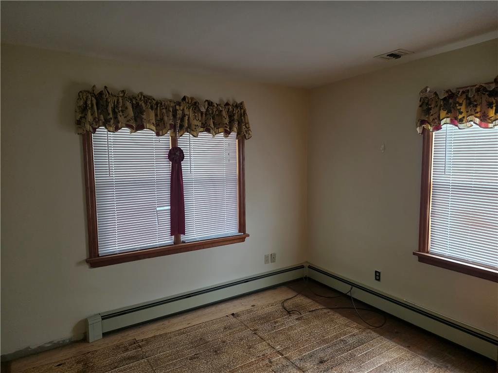 2838 Cherryville Road Northampton, PA 18067 - Photo 16 of 22 Well-lit room with multiple windows offering natural illumination and baseboard heating.