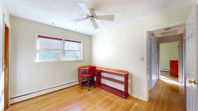 a room with furniture and a window