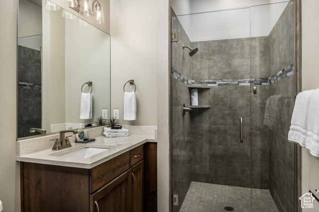 2600 Ocotillo Way, Unit 34 Santa Clara, UT 84765 - Photo 23 of 43 Bathroom with vanity and a stall shower
