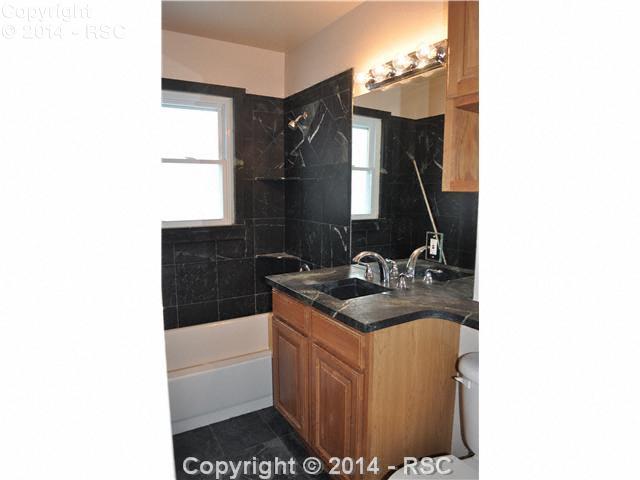 2406 Lafayette Road Colorado Springs, CO 80907 - Photo 12 of 21 Tile Flooring, Custom Solid surface